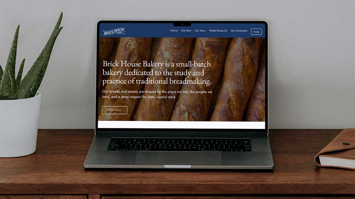 Brick House Bakery Mug Computer with website design