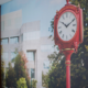 Large wall graphic showing the Indiana University clock