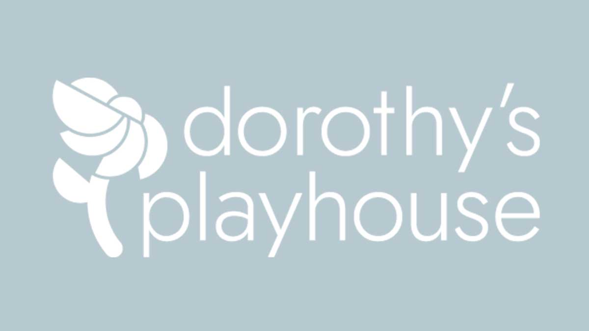 White Dorothy's Playhouse logo on blue background with geometric floral logo mark