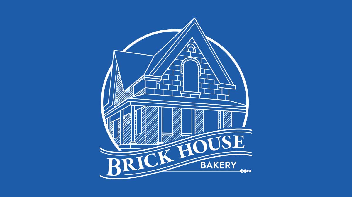 White logo of brick house against blue background